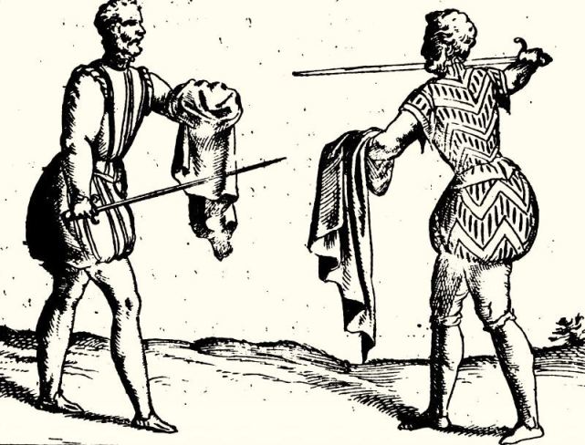 If the cloak wrapped around the arm is long, large, and flexible, it "will warde any edge blow." (Giacomo Di Grassi's sword manual published in 1570, republished in English in 1594. Defence with the cloak becomes more perfected  by 1653 with Francesco Alfieri's sword treatise.)