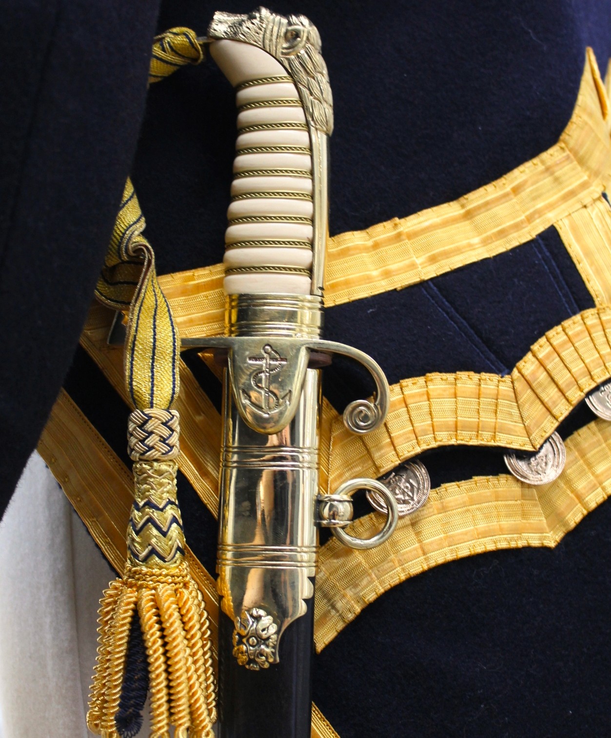 1805 Royal Navy sword hilt with sword knot and gold uniform braid